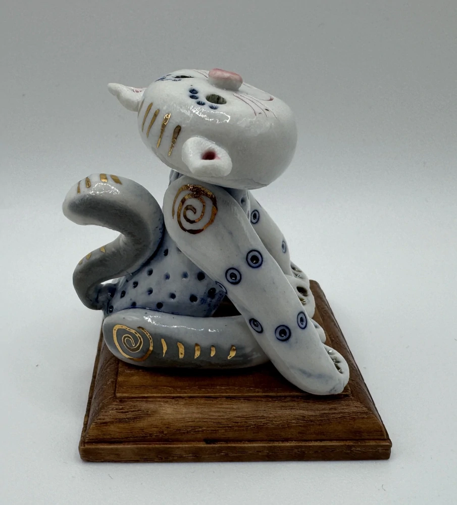 Motlík Ondřej: Kočka tlapky vedle sebe