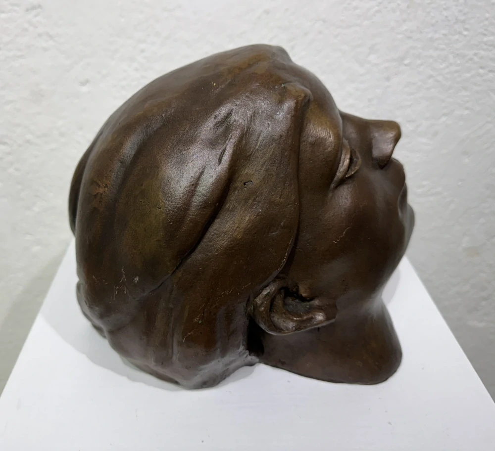 Otto Gutfreund: Dívčí hlava s rozevlátými vlasy