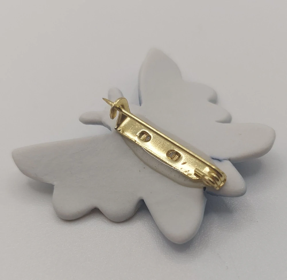 Motlíková Zuzana: Brož (motýlek)