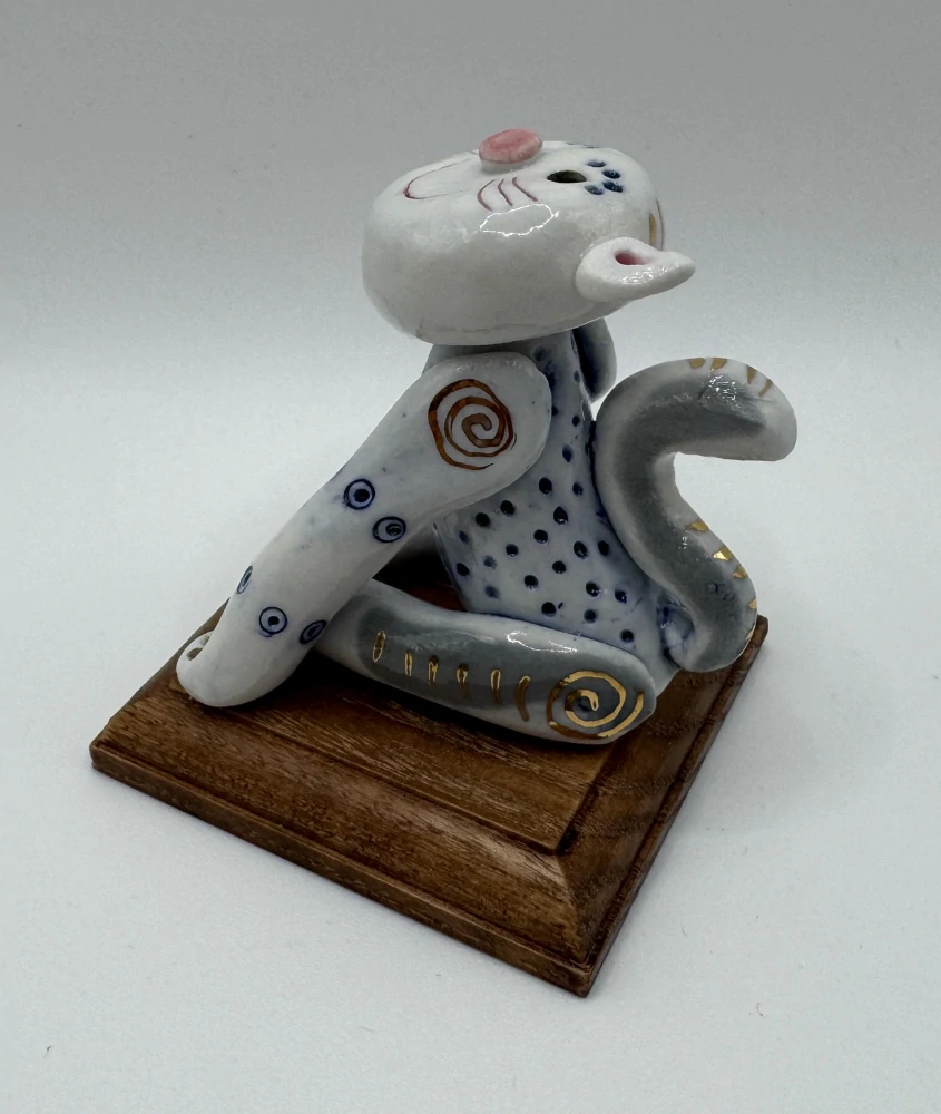 Motlík Ondřej: Kočka tlapky vedle sebe