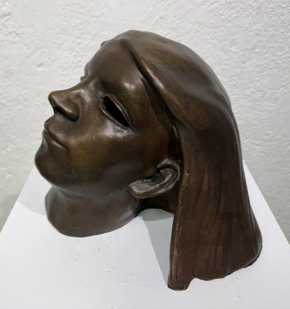 Otto Gutfreund: Dívčí hlava s rozevlátými vlasy