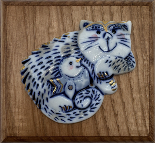 Motlíková Zuzana: Kočička ležící (s ptáčkem v náručí) II.