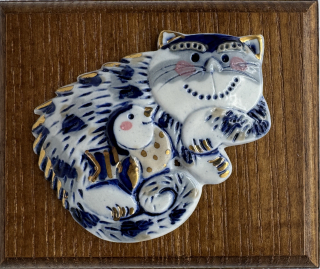 Motlíková Zuzana: Kočička ležící (s ptáčkem v náručí)